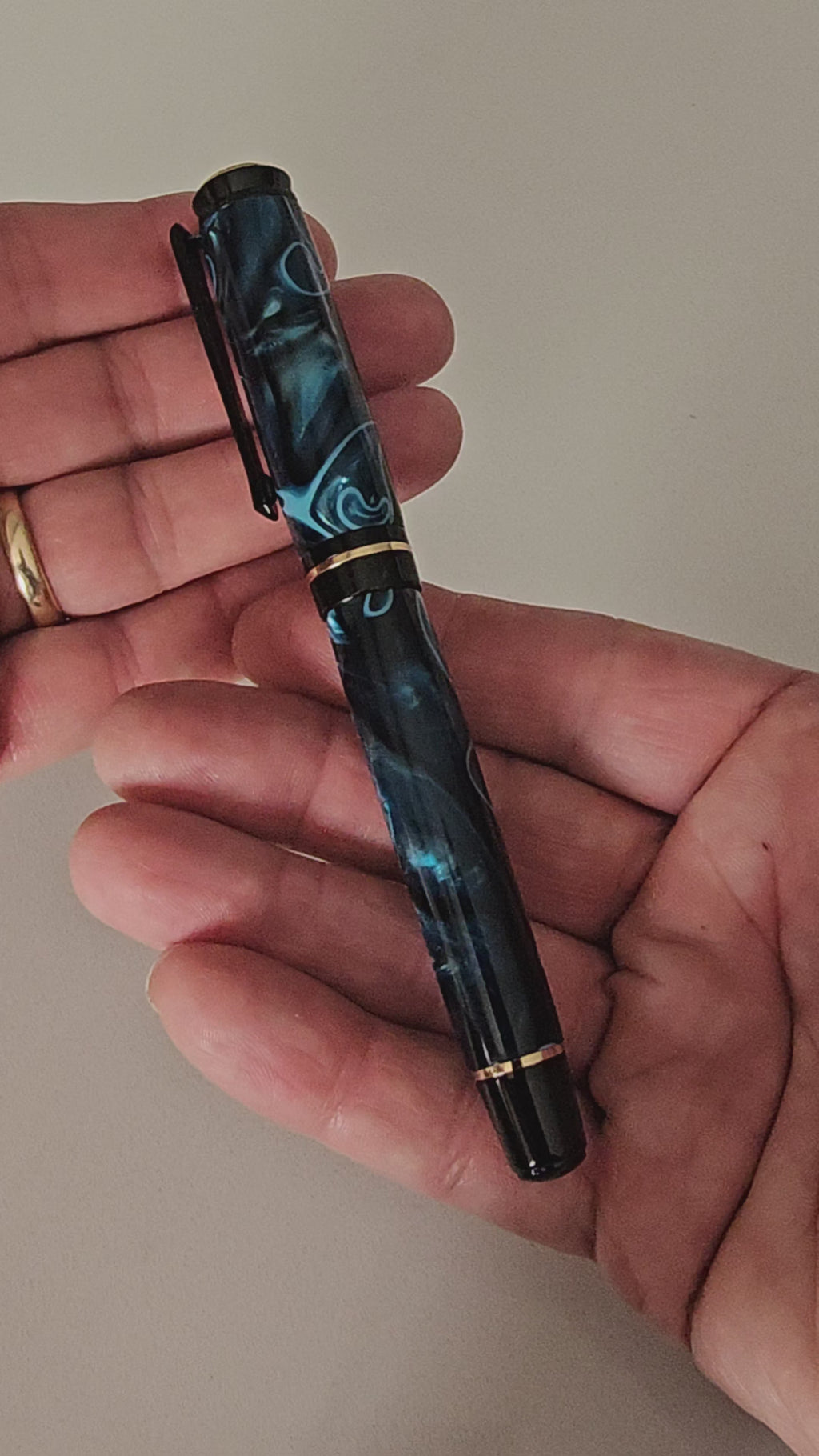 Blue Nebula Fountain Pen. Hand-turned with a deep blue and shimmering silver acrylic resin .