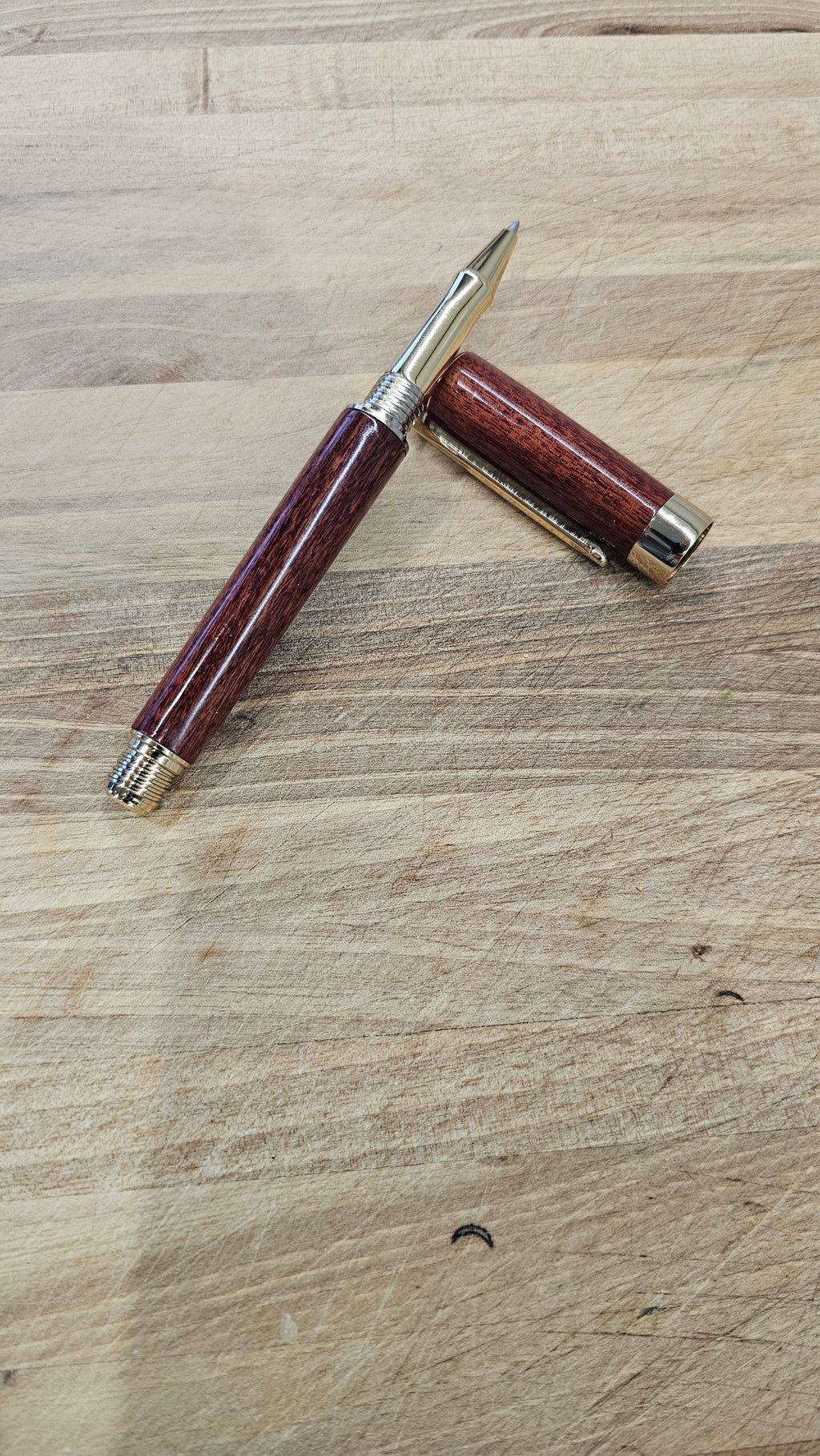 Custom Order Wood turned Rollerball Pen. Finished in Sapele African hardwood with black and red stain