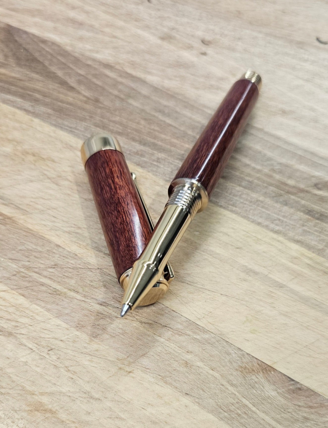 Custom Order Wood turned Rollerball Pen. Finished in Sapele African hardwood with black and red stain