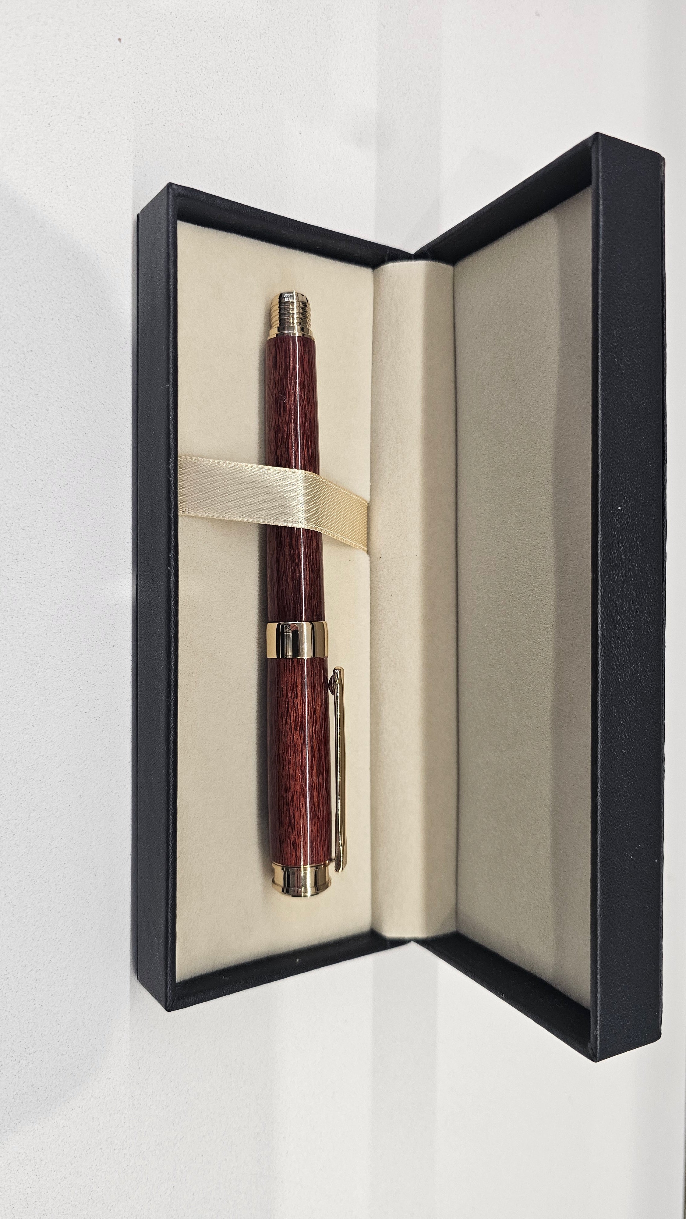 Custom Order Wood turned Rollerball Pen. Finished in Sapele African hardwood with black and red stain