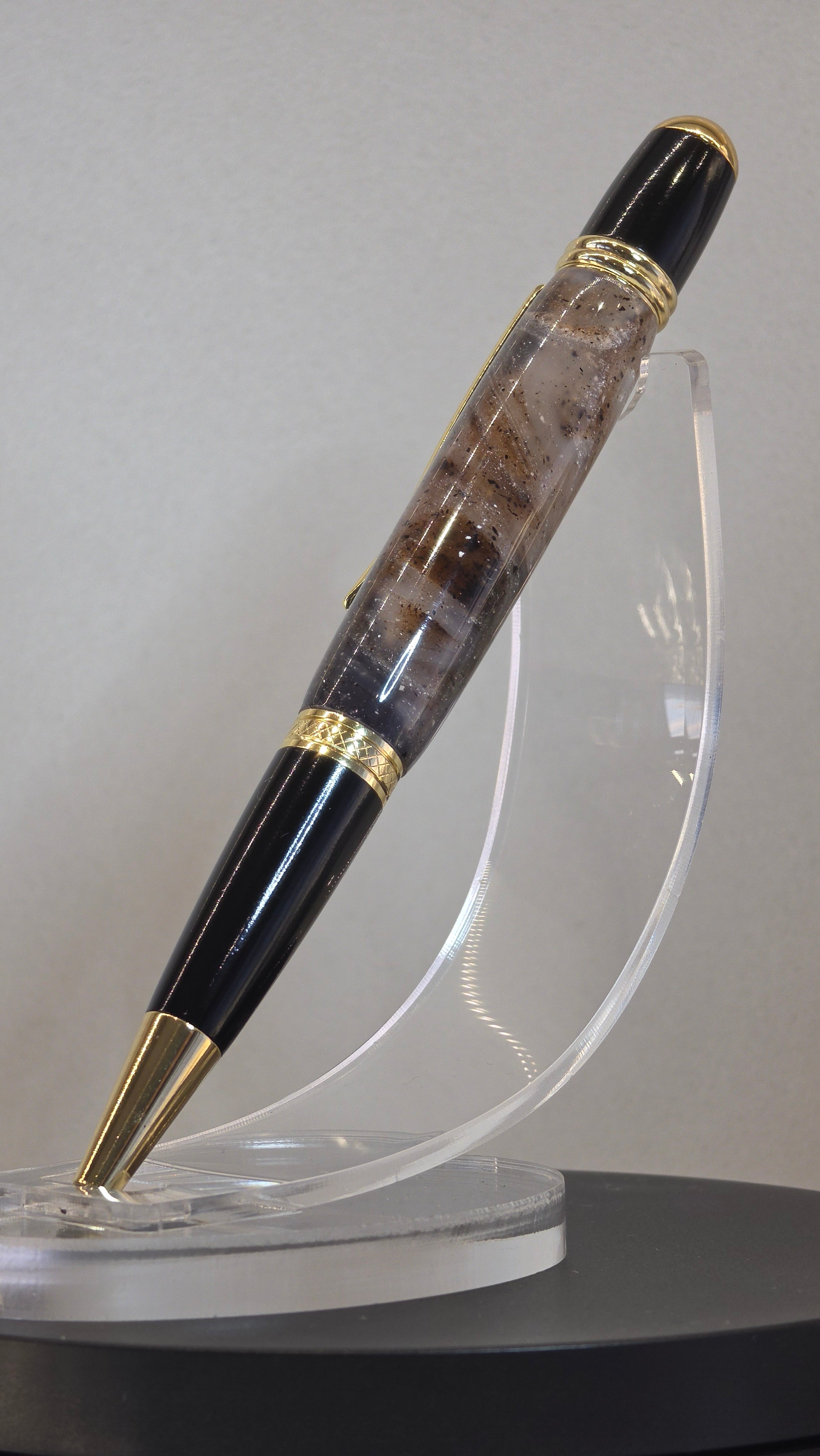 Twist Rollerball pen. Hand turned resin barrel with gold plated trims and clip