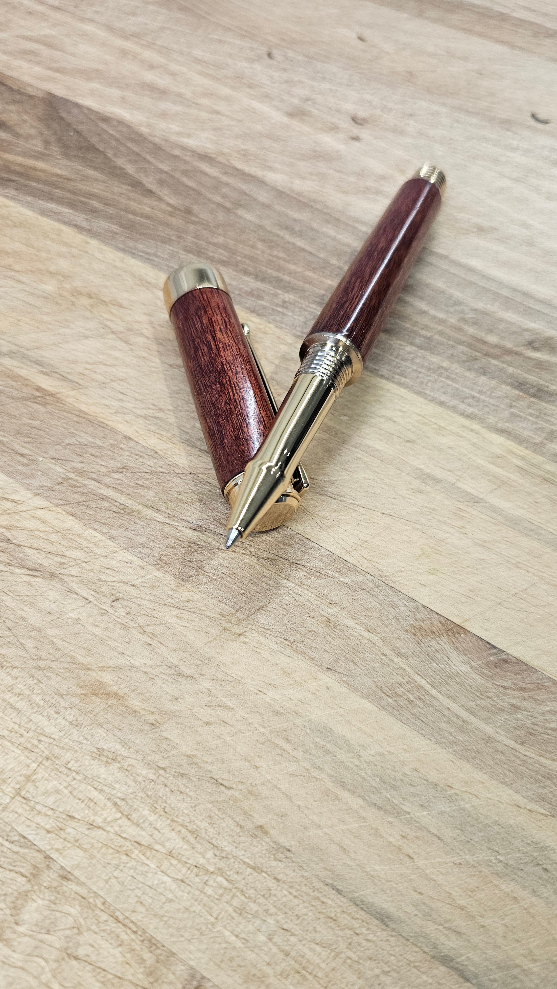 Custom Order Wood turned Rollerball Pen. Finished in Sapele African hardwood with black and red stain